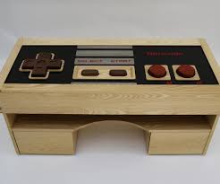 Coffee tables seem to be the new trend when it comes to custom made builds by geeks. Functional Nintendo Controller Coffee Table 3 Steps With Pictures Instructables