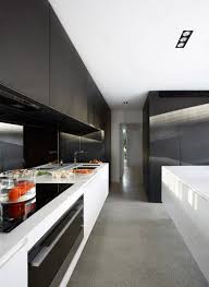 Black And White Kitchen Matt Kitchen Matt Black Handleless Upper And Pantry Cabinets White Handleless Lower Cabinets And Island Mirror Sp Concrete Kitchen Floor Concrete Kitchen Kitchen
