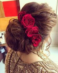 Indian Bridal Hairstyles Inspiration Messy Hair Buns Adorned With Red Roses Indian Bridal Indian Bridal Hairstyles Bridal Hair Inspiration Messy Hairstyles