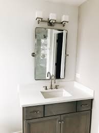 Mounted to the wall on two hinged pivots, these mirrors can tilt up or down. Avoid These Two Major Mistakes When Buying Bathroom Vanity Mirrors First Thyme Mom