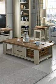 This is a rounded table that is great for braking up straight lines on your sectional. 22 Coffee Tables Ideas Painted Coffee Tables Coffee Table Furniture