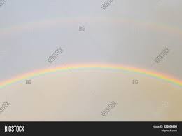 What kind of rainbow is in the sky? Two Rainbows Sky Image Photo Free Trial Bigstock