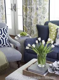 Pink paint, pink living room chairs, pink scatter cushions and even a pink accented gallery wall; I M Picturing Something Along This Color Scheme But Add A Bit Of Orange Coral As Well Blues Grays Living Room Designs Traditional Family Room Home Decor