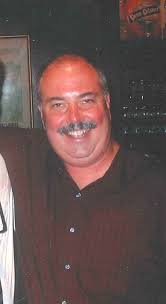 Michael J. “Mike” Rudolph...