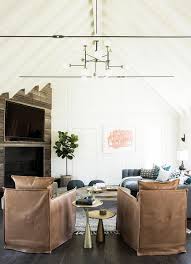 Our living room chairs span the style spectrum, from elegant wing chairs to comfy recliners, and many are available for fast delivery. Brown Leather Accent Chairs With Gold Accent Tables Transitional Living Room