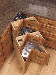 Cornered drawers are built into the corner cabinet and then easily pulled out. Empty Corner Space In Kitchen With Images Corner Drawers Home Remodeling Kitchen Design