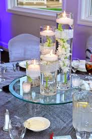 In this video, floral designer and stylist. Wedding Centerpiece Vases Ideas Best Wedding Centerpiece Ideas Floating Candle Centerpieces Wedding Flower Arrangements Table Candle Centerpieces