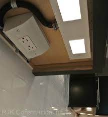 A Way To Hide Gfci Outlet In Kitchen Kitchen Under Cabinet Lighting Kitchen Outlets Under Cabinet Lighting