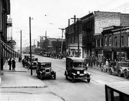 The Avenue In 1936 Hampden Viewed From Roland Avenue Showing Cavacos Pharmacy The New System Bakery Ideal The Hampden Historic Baltimore Baltimore City