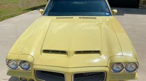 Image result for Canary Yellow 1972 Hussmann