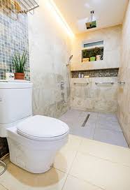 A clash of colors and poor design elements left this bathroom in a frenzy. These 5 Tiny Bathroom Makeovers Show Clever Space Solutions