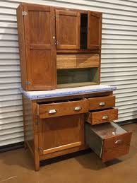 antique oak hoosier cabinet with wilson