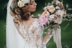 We did not find results for: Portrait Of A Beautiful Bride With Fresh Flowers In Her Hair And A Wedding Bouquet Of Flowers Posing On A Background Of Green Fields Stock Photo Picture And Royalty Free Image Image