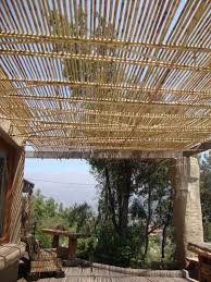 Pergolas with a roof are often referred to as pavilions. Terraza Bambu Bamboo Terrace Maira Bisquett Chang