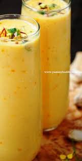 Put mango, yogurt, milk, sugar and cardamom into a blender and blend for 2 minutes. Mango Lassi Recipe Yummy Traditional