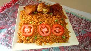 Nigerian jollof rice is probably one of the most talked about dishes from nigeria in any part of the world where it has been eaten. Jollof Rice And Chicken Recipe Easy Party Jollof Rice How To Make Christmas Inspired Youtube