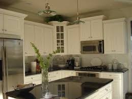 Alternating Cabinet Heights Staggered Kitchen Cabinets Small White Kitchens Traditional Kitchen Design