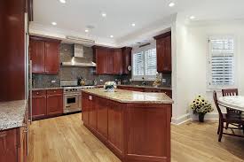 Best backsplash colour for stained wood cabinets add in a gray quarter countertop and some pendant lighting for a really eye catching kitchen look. 43 Kitchens With Extensive Dark Wood Throughout Home Stratosphere
