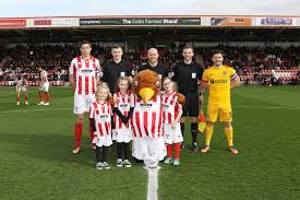 Promoted to division three 1999. Mascot Packages Cheltenham Town Fc
