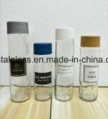 Source approved by the ministry of health, malaysia approval number: China Cylinder Shape Beverage Voss Glass Mineral Water Bottle With Color Cap China Glass Bottle Beverage Bottle