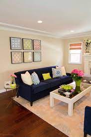 Neutral Transitional Living Room With Navy Blue Sofa Small Apartment Living Room Blue Living Room Decor Navy Living Rooms