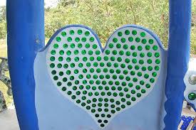 Garden glass bottle retaining wall. How To Make Bottle Bricks For Bottle Walls Pangea Builders