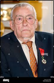 Michel Duchaussoy at a ceremony honoring actors Claude Rich, Michel  Duchaussoy, and animator Jose Artur at the Ministry of Stock Photo