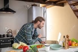 Sign up for the food network news newsletter privacy policy Learning To Cook A Man Watching Video Tutorials On Cooking A Salad Stock Photo Picture And Royalty Free Image Image 138532679