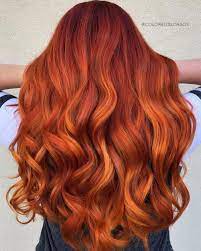 Top 10 Fall Hair Colors Of 2021 According To Colorists This Autumn Ginger Hair Color Red Orange Hair Fall Hair Color