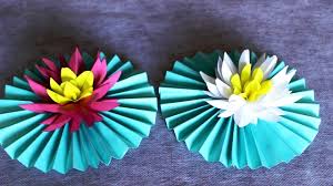The lotus flower symbolizes purity and enlightenment. Paper Lotus Flower Lotus Flowers Making Paper Flowers Paper Crafts Paper Lotus Paper Flowers Flower Making