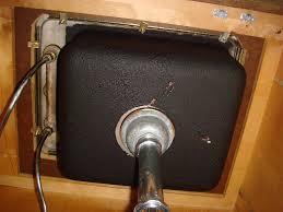 asbestos sink under coating (black