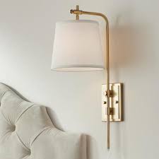 A warm gold finish and adjustable features are the main focus of this contemporary wall light. Seline Warm Gold Adjustable Plug In Wall Lamp Plug In Wall Lamp Plug In Wall Sconce Wall Sconces Bedroom