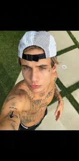 Jayden Cross Through Matching Tattoo