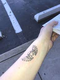 Small Wrist Tattoo Angel Wings Halo Birthdate Small Wrist Tattoos Angel Wings Tattoo Small Angel Wing Tattoo