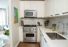 This waterborne acrylic enamel dries to a smooth finish and resists stains and marring to help ensure that it remains attractive over time. The Dos And Don Ts Of Painting Laminate Cabinets Laminate Kitchen Cabinets Laminate Cabinets Painting Laminate Kitchen Cabinets