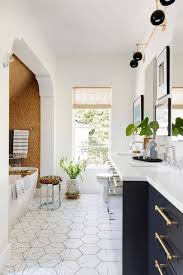 Here, the black hexagonal tile covers the wall while the bw moroccan tile handles the flooring. 75 Beautiful Eclectic Bathroom Pictures Ideas August 2021 Houzz