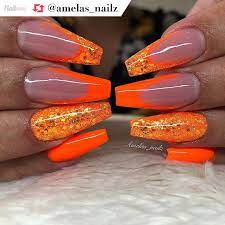 Gorgeous Neon Orange Coffin Nails And Glitter Details By Amelas Nailz Orange Acrylic Nails Neon Acrylic Nails Orange Nails