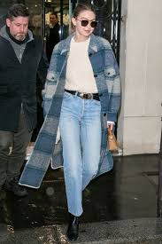 Who made gigi hadid's blue iphone case, jewelry, jeans, white tee, round sunglasses, black backpack, and brown velvet coat? 49 Gigi Hadid Street Style Outfits You Ll Want To Copy Immediately Photos