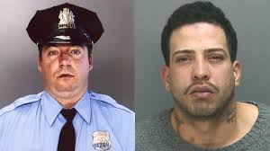 Philadelphia Police Officer Edward Davies (L) was shot in the stomach following a violent struggle with Eric Torres (R) inside a Feltonville corner store ... - Davies-and-Torres
