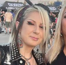 Helping an injured pigeon with a drooping wing?