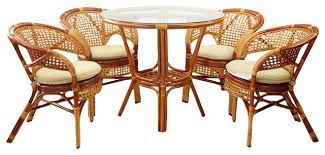 This is an indoor rattan and wicker sunroom or living room collection. 5 Piece Pelangi Dining Rattan Wicker Armchairs And Round Table Glass Top Tropical Dining Sets By Rattanusa Houzz