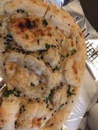 Chef john's garlic naan are made with a simple dough enriched with yogurt and homemade garlic butter and cooked in a blazing hot cast iron skillet the kitchen garden. Garlic Naan Bread Picture Of Deep Indian Kitchen New York City Tripadvisor