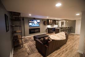 This bar provides the perfect place to hang out and relax. Franklin Mi Basement Remodel Rustic Industrial Design By Fbp