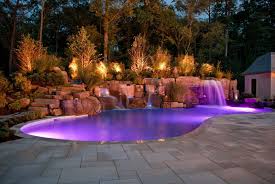This Inground Pool Features Fiber Optic Lights Led Pool Lights Four Waterfalls A Swim In Grotto Glas Piscina No Quintal Luz Para Piscina Paisagismo Piscina