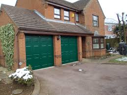 Go green with your garage. Photo Gallery Of Up Over Garage Doors Garage Doors Online Photo Gallery Of Up Over Garage Doors