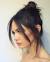 Wispy Messy Bun With Bangs