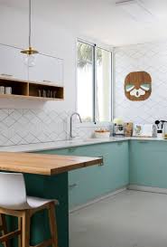 9 Green Kitchens That Are Positively On Trend Hunker Green Kitchen Kitchen Decor Kitchen Cabinet Trends