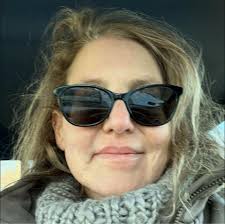 Winterizing iris plants with healthy green leaves