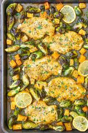 One Pan Lemon Chicken With Butternut Squash And Brussels Sprouts Recipe Recipes Food Cooking Recipes