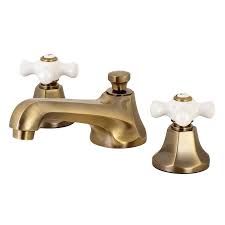 Bathroom vanities have the ability to transform your powder room into a space of luxury. Kingston Brass Metropolitan Antique Brass 2 Handle 8 In Widespread Bathroom Sink Faucet With Drain Lowes Com Antique Brass Bathroom Faucet Antique Brass Faucet Bathroom Faucets